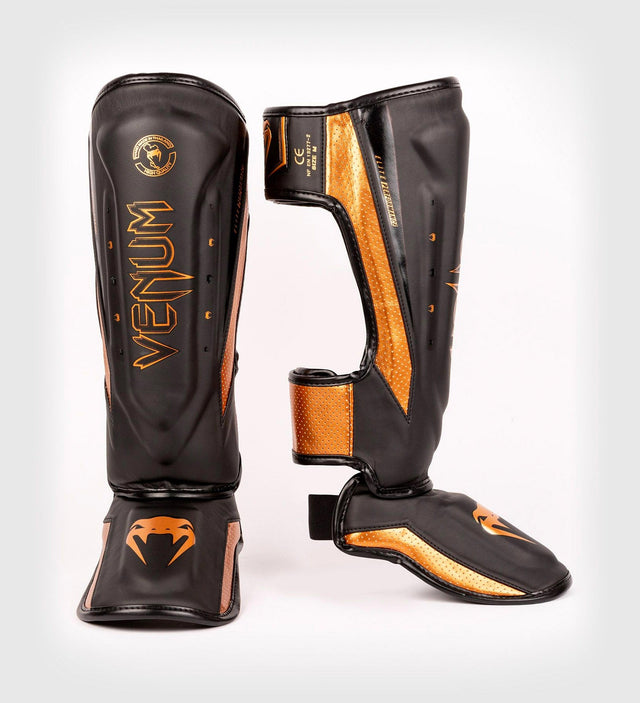 Protège-tibias Venum Elite Evo – Noir/Bronze – Protège-tibias