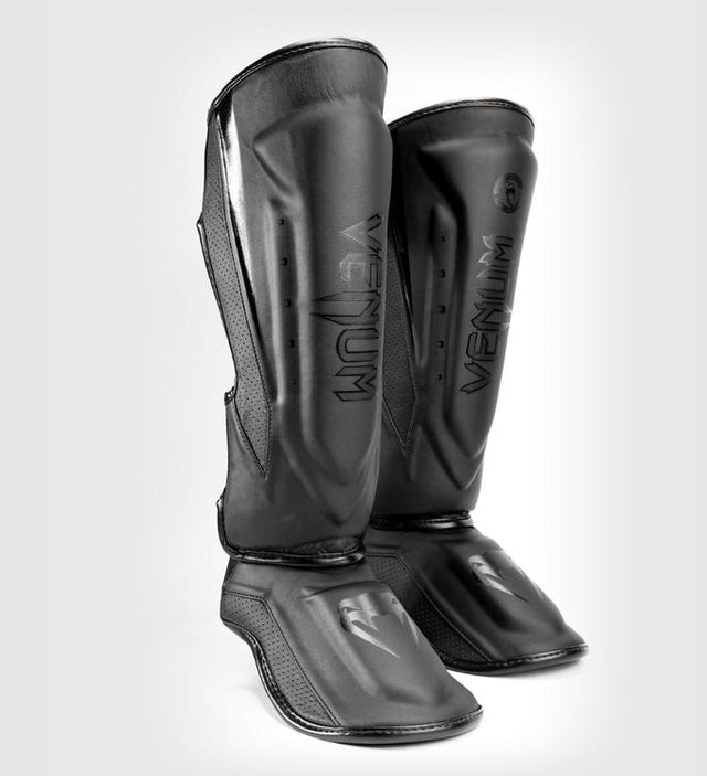 Protège-tibias Venum Elite Evo – Noir/Noir – Protège-tibias