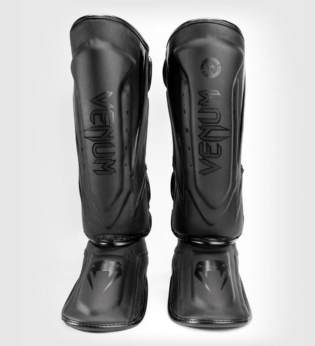 Protège-tibias Venum Elite Evo – Noir/Noir – Protège-tibias