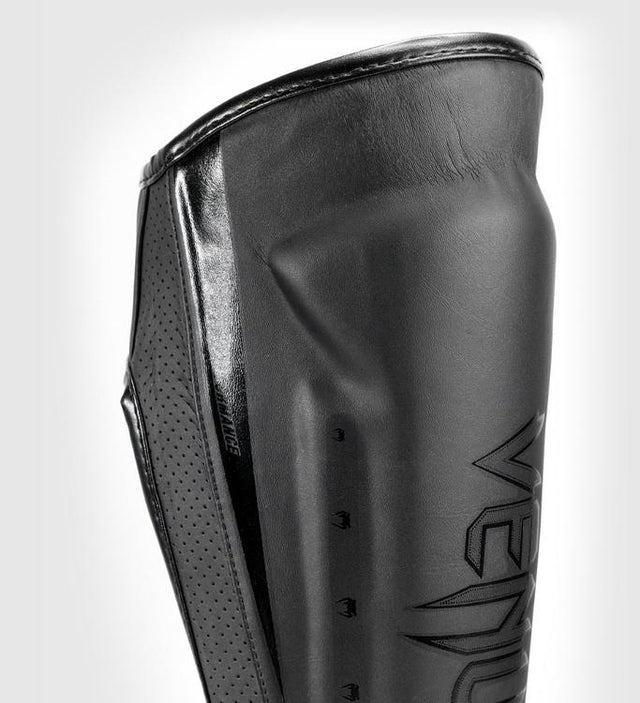 Protège-tibias Venum Elite Evo – Noir/Noir – Protège-tibias