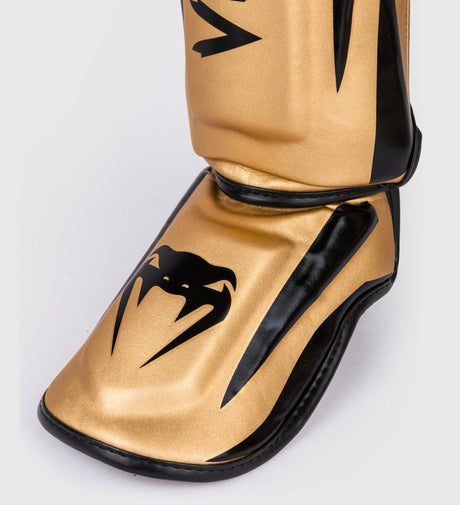 Venum Schienbeinschoner Elite – Gold/Schwarz – Schienbeinschoner