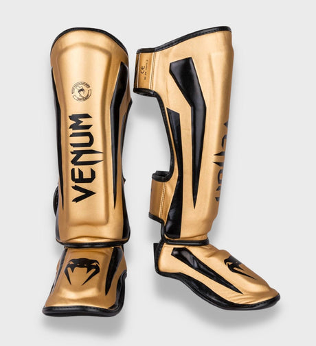 Venum Schienbeinschoner Elite – Gold/Schwarz – Schienbeinschoner