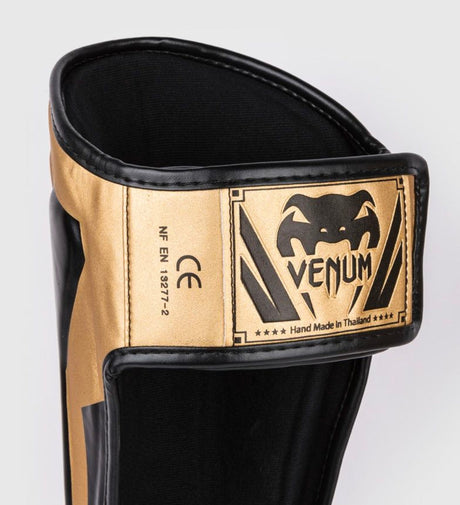 Venum Schienbeinschoner Elite – Gold/Schwarz – Schienbeinschoner