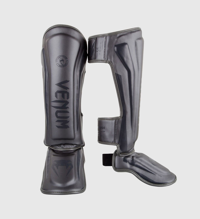 Espinilleras Venum Elite – Gris