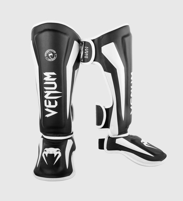 Espinilleras Venum Elite – Negro/Blanco